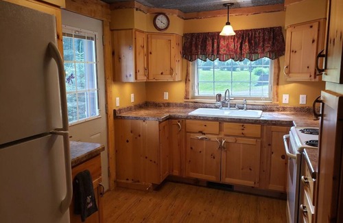 Butternut Cabin | Blissful cozy, year round, lakeside cabin on Butternut Lake. Dogs welcome.