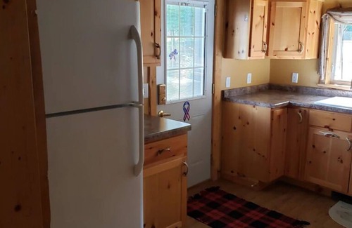 Butternut Cabin | Blissful cozy, year round, lakeside cabin on Butternut Lake. Dogs welcome.