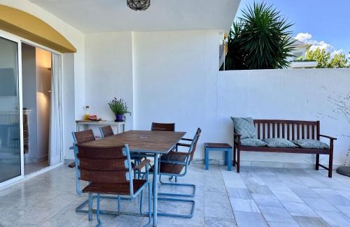 Guadalmina Apartment | Blue House in Guadalmina Baja, with a large terrace overlooking the Golf