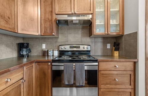 Southwest Calgary Apartment | Blue Moon | Playground | Backyard | Pet Friendly