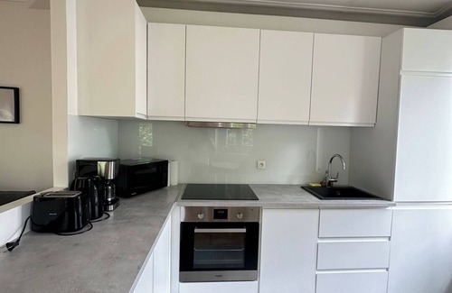 Epinettes Apartment | BnBNook - Bright 1BR Near Montmartre and Sacre-Cœur