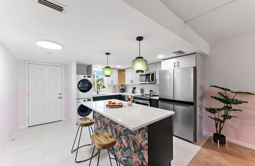 Avon By The Sea Condo | Boho-Chic Beachfront Escape: Pool, Private Balcony & Steps to the Pier