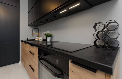 Wlochy Apartment | Borsucza Modern Apartment by Renters