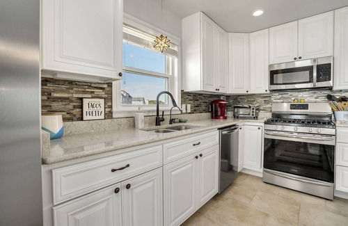 Captain's Cove House | Breathe the Bay - Waterfront w/Dock, Pool & Golf!