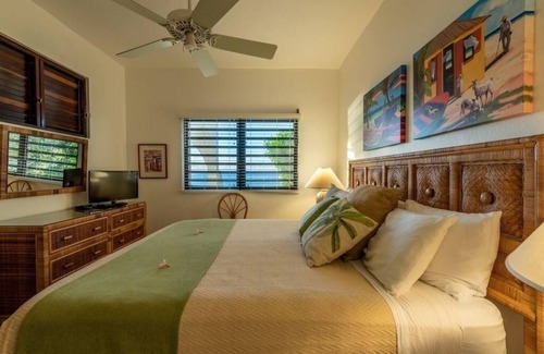 West End Village House | Breathtaking Sunset at Our Beach Front Stay | Living Area & Private Patio