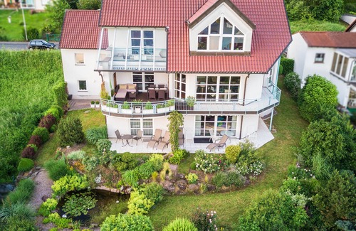 Bad Bocklet Apartment | Bright apartment (68 sqm) for up to 4 people with terrace and view over the Saale valley