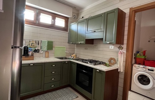 Fertilia Apartment | BRIGHT APARTMENT WITHIN WALKING DISTANCE FROM THE SEA