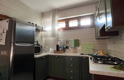 Fertilia Apartment | BRIGHT APARTMENT WITHIN WALKING DISTANCE FROM THE SEA