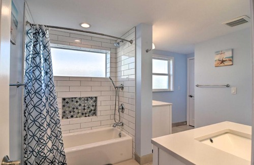 Whitney Beach House | Bright Canalfront House with Pool in San Remo Shores