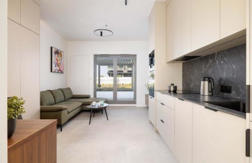 Katowice Apartment | Bright Studio in Katowice with Parking, Sauna & Gym by Noclegi Renters