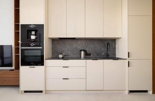 Katowice Apartment | Bright Studio in Katowice with Parking, Sauna & Gym by Noclegi Renters