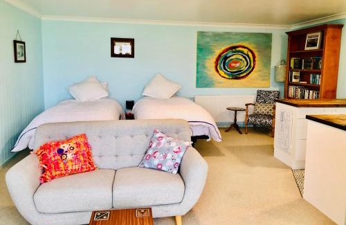 Oban House | Butterfield Beach Studio Car petrol and breakfast provisions included