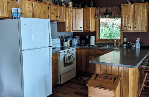 Phillips Cabin | Cabin on Soo Lake. Enjoy the views of the lake 66' from water's edge.