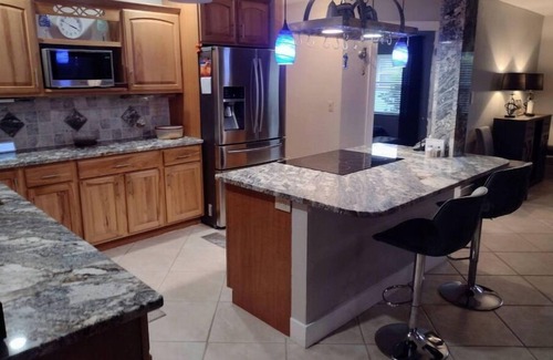 Fort Myers Shores House | Caloosahatchee's Family Retreat and Tiki Bar