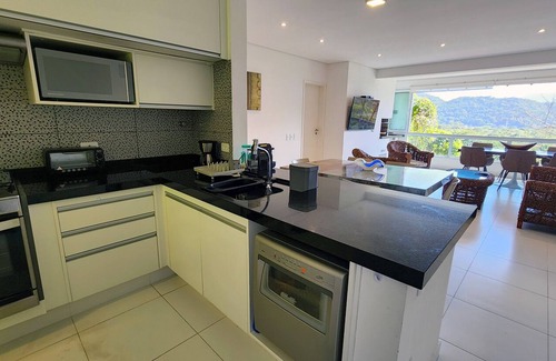 Sao Sebastiao Apartment | Camburyzinho, gated community 3 suites, panoramic views and privacy.