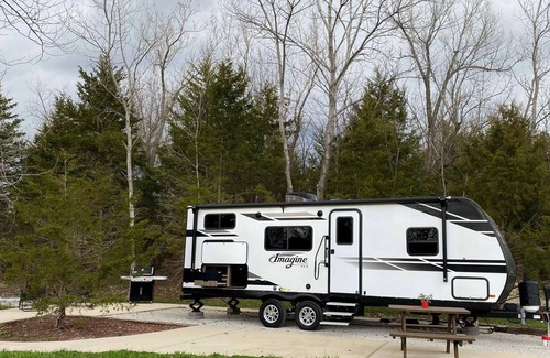 Peculiar House | Camping Adventure in new RV, Patio,Fire pit & BBQ Grill