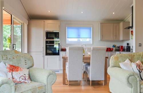 Rowrah Cottage | Canadian timber lodge with direct views to the Alpacas.