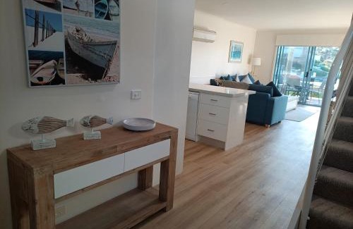 Paynesville Apartment | Captains Cove Resort - Waterfront Apartments