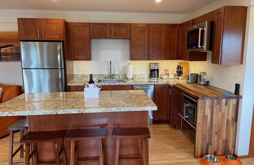 Northeast Carmel House | Carmel Big Sur-Style Guest House with Hot Tub, bank of windows, decks & VIEWS!