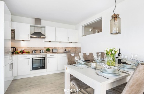 Olpenitz Apartment | Carpe Diem - directly on the water, terrace, bathtub, infrared sauna, washing machine