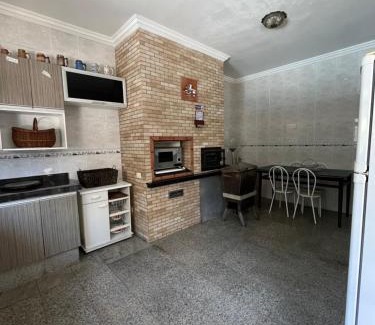 Canto do Forte House | casa aconchegante com lazer completo