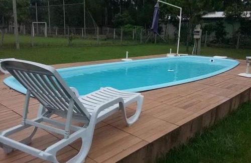 Torres House | Casa com piscina e salão de jogos para aluguel de temporada e finais de semana em Torres/RS.