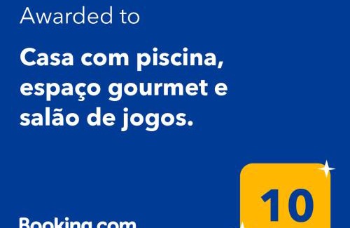 Caneca Fina House | Casa com piscina, espaço gourmet e salão de jogos.