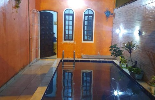 Aviacao House | Casa com piscina para temporada em Praia Grande