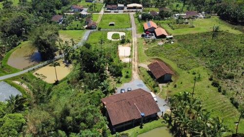 Guaramirim House | casa do lago, paz e sossego.
