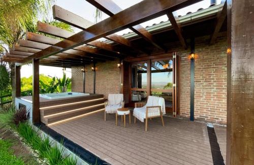 Santa Clara do Sul House | Casa refúgio na Vila Tekohá vista acima das nuvens