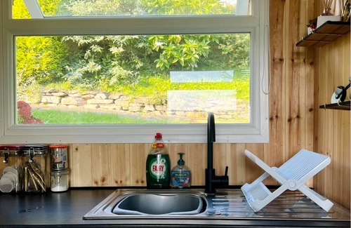 Bryn-crug Ski Chalet | Cedar Chalet in Snowdonia Wales. Stunning Woodland Views & Pool, Family & Pets