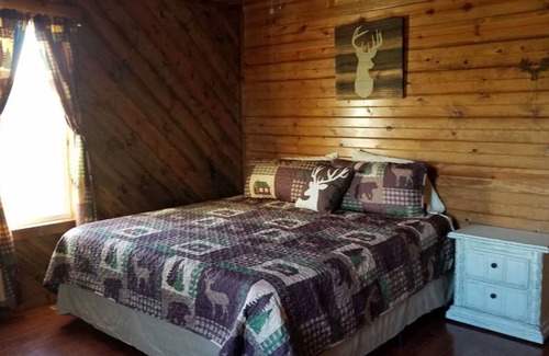 El Dorado Springs Cabin | Cedar Lodge is quaint rustic lodge with modern amenities. Relaxing and warm!