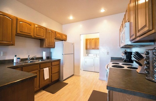 Evergreen House | Centrally-located two bedroom, two bathroom townhome with washer and dryer in a quiet neighborhood