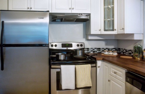 Fairview Condo | Centrally Located Warmingly Cozy and Spacious Home