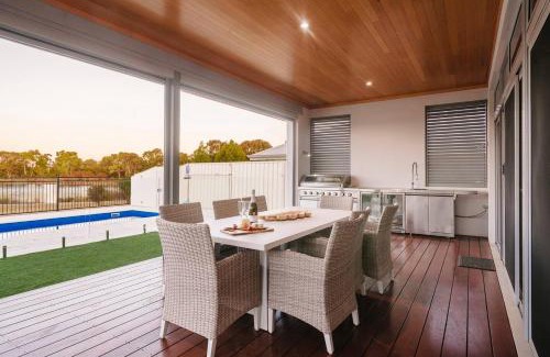 Dunsborough House | Ceol Na Mara - Luxury Pool Escape with Golf Views
