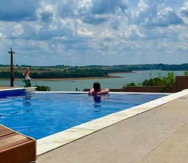 Piratuba House | Chácara Arena JK com Piscina integrada com Sauna e Hidromassagem