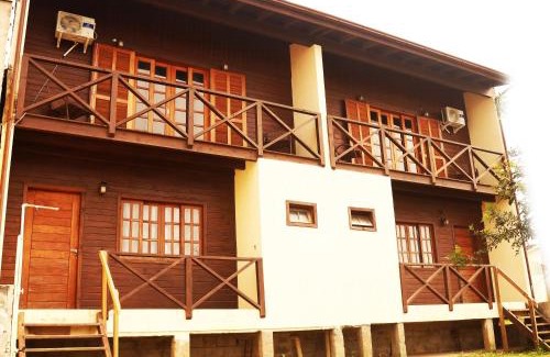 Vila Alvorada House | Chalé com Piscina Aquecida - Vista Panorâmica da Praia, a 200m do Mar, Sala de Jogos, Academia e Churrasqueira