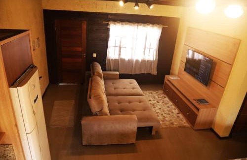 Vila Alvorada House | Chalé com Piscina Aquecida - Vista Panorâmica da Praia, a 200m do Mar, Sala de Jogos, Academia e Churrasqueira