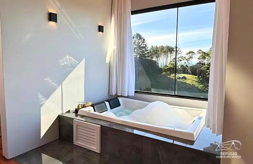 Bom Retiro Ski Chalet | Chalé Romântico Serra Catarinense Hidro e Lareira