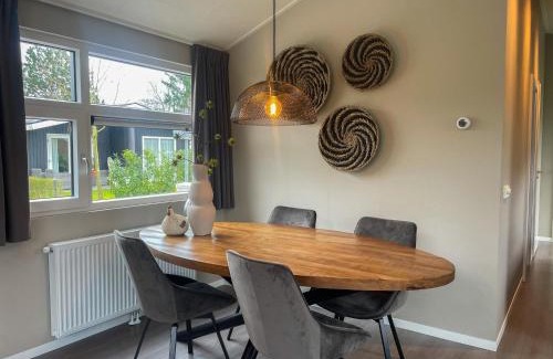 Municipality of Veldhoven Ski Chalet | Chalet by Park Pond in the Netherlands