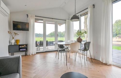 Hoogersmilde Ski Chalet | Chalet in Dutch Park with Garden and Terrace