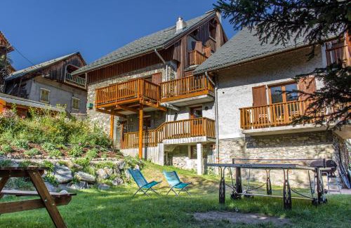 Vaujany Ski Chalet | Chalet Rostaing - Incredible vaulted ceiling dining room and breathtaking garden