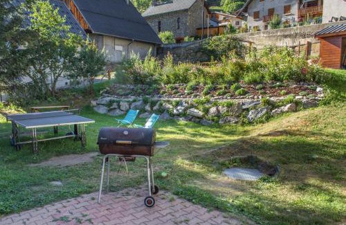 Vaujany Ski Chalet | Chalet Rostaing - Incredible vaulted ceiling dining room and breathtaking garden