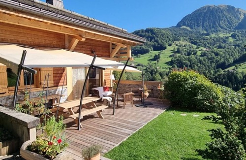 Manigod Ski Chalet | Chalet with panoramic mountain views, south-facing and cosy interior