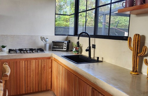 Paraiso House | Charming 2-bedroom house with AC, WiFi in peaceful Playa Negra