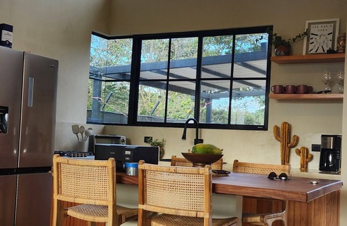 Paraiso House | Charming 2-bedroom house with AC, WiFi in peaceful Playa Negra