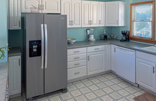 Colington Harbour House | Charming 4BR waterfront home with Private Hot Tub