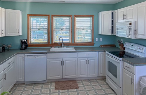 Colington Harbour House | Charming 4BR waterfront home with Private Hot Tub