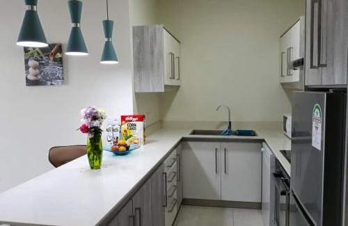 Flic-en-Flac Apartment | Charming apartment in Flic en Flac with shared pool