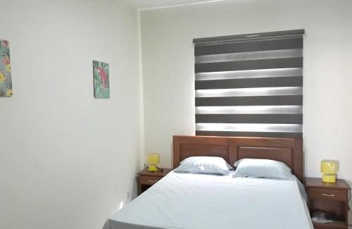 Flic-en-Flac Apartment | Charming apartment in Flic en Flac with shared pool